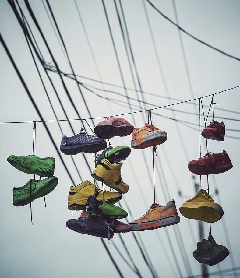 Top 101+ Images why are shoes hung on power lines Updated
