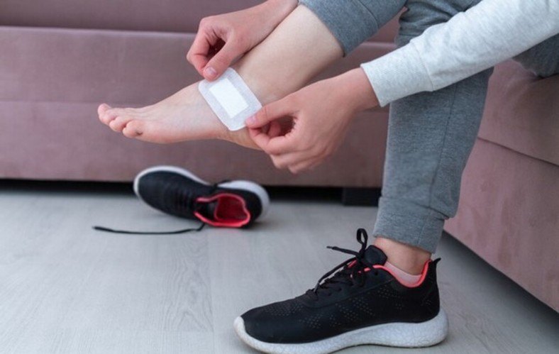 tie shoes to prevent heel slippage