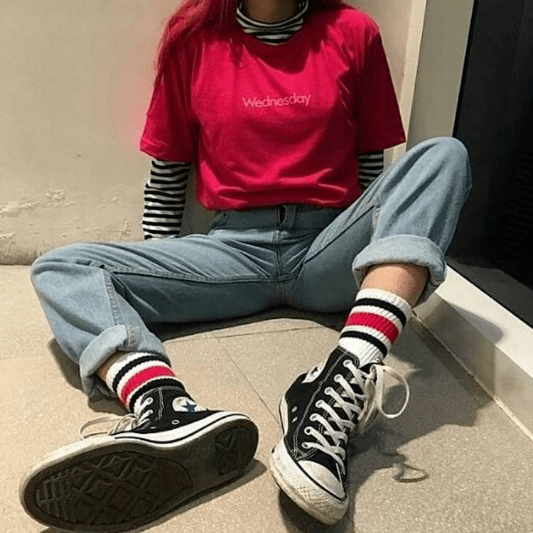 Low-Cut Shoes With Funky Socks And Cuffed Jeans