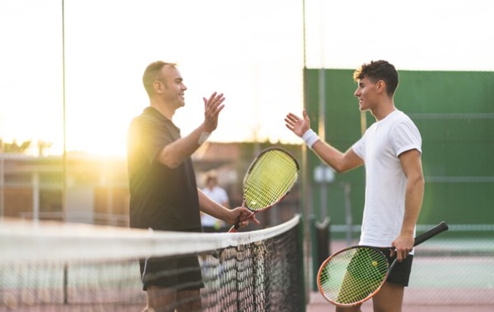 Playing tennis