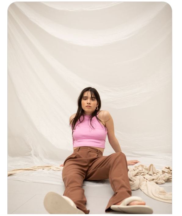 Pink Halter Crop Top with Brown Tailored Pants and White Flip-flops