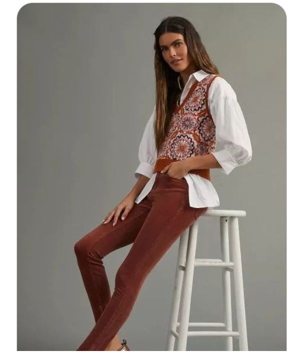 Patterned Sleeveless Sweater, Puff Sleeves Shirts with Skinny Brown Pants, and Leather Loafers 