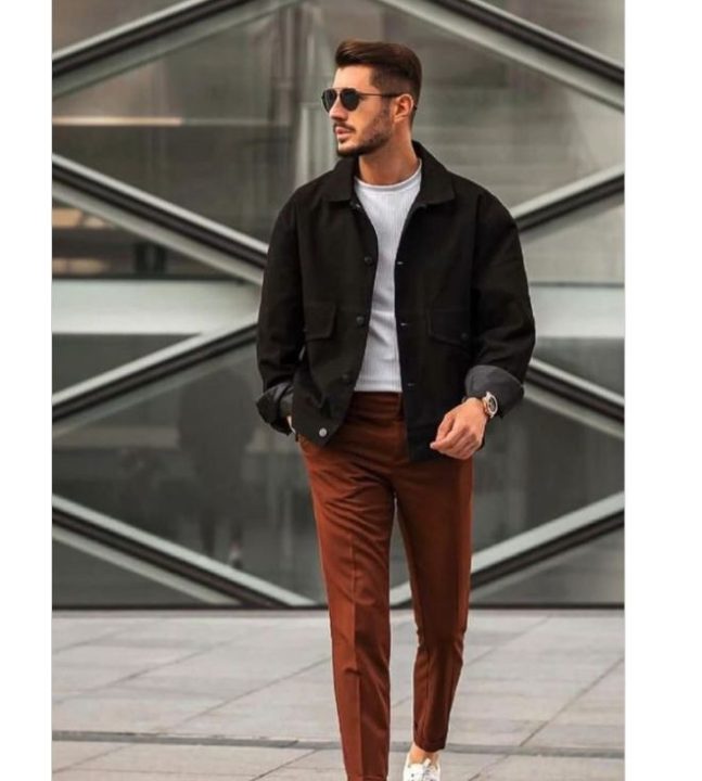 Light Grey T-shirt with Black Denim Jackets and Brown Chinos Pants with White Sneakers