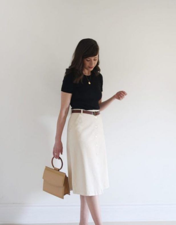 Mules with a simple dark t-shirt tucked in a long skirt