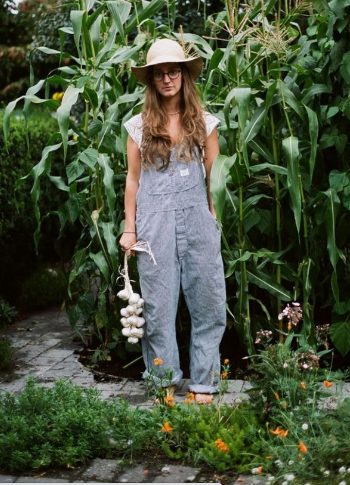 Denim Overalls, A Simple T-Shirt, And A Wide-Brimmed