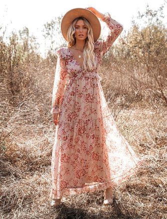 Floral Ruffle Maxi Dress Compared With Boots And A Wide-Brimmed Hat