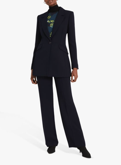 Suit Trousers With A Blouse And A Jacket