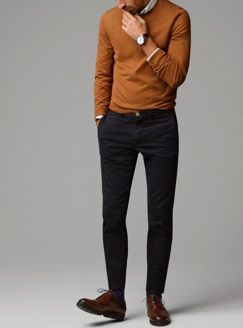 Trousers and Sweater Over a Shirt