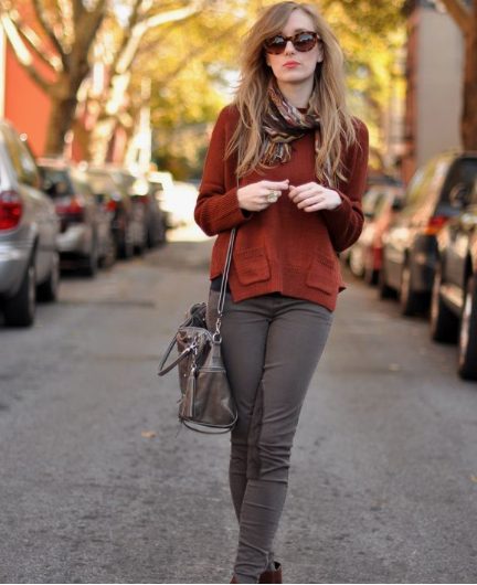 Red-orange Sweater with Grey Jeans