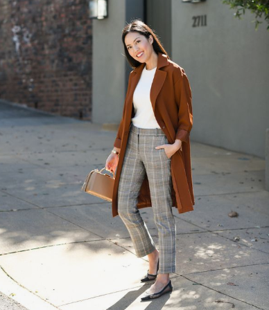 White T-shirt and Orange Overcoat with Grey Checkered Trousers