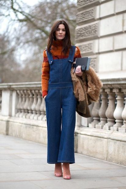 A Orange Sweater With Light Blue Denim Overalls