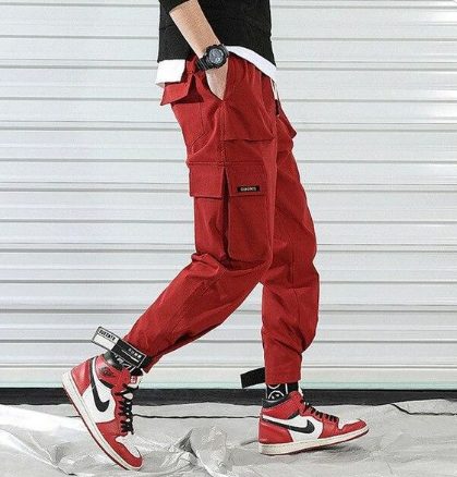 Red Sweatpants And Bright Sneakers