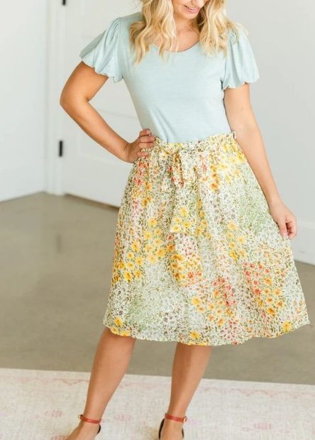 Paired With A Mint Shirt And A Flowery Midi Skirt