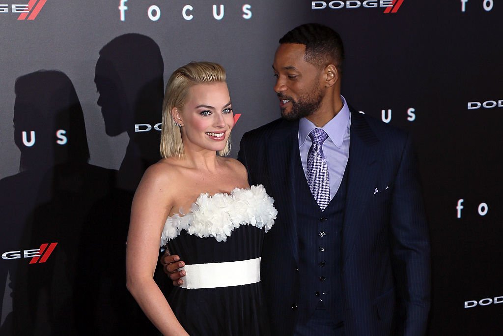 Margot Robbie  and Will Smith attend the premiere of Warner Bros