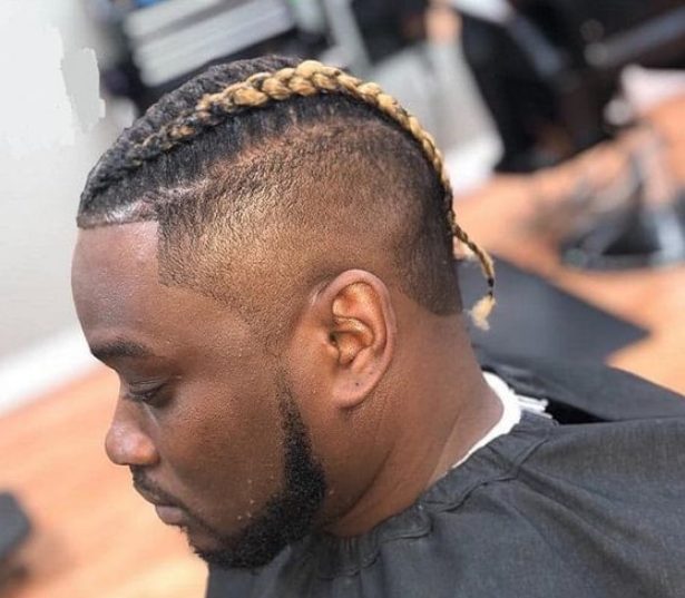 Reverse cornrow braids with excessive bald fade