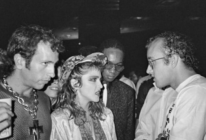 Keith Haring, Juan Dubose, and Kenny Scharf with Madonna after her Virgin Tour concert at Radio City Music Hall in New York City.