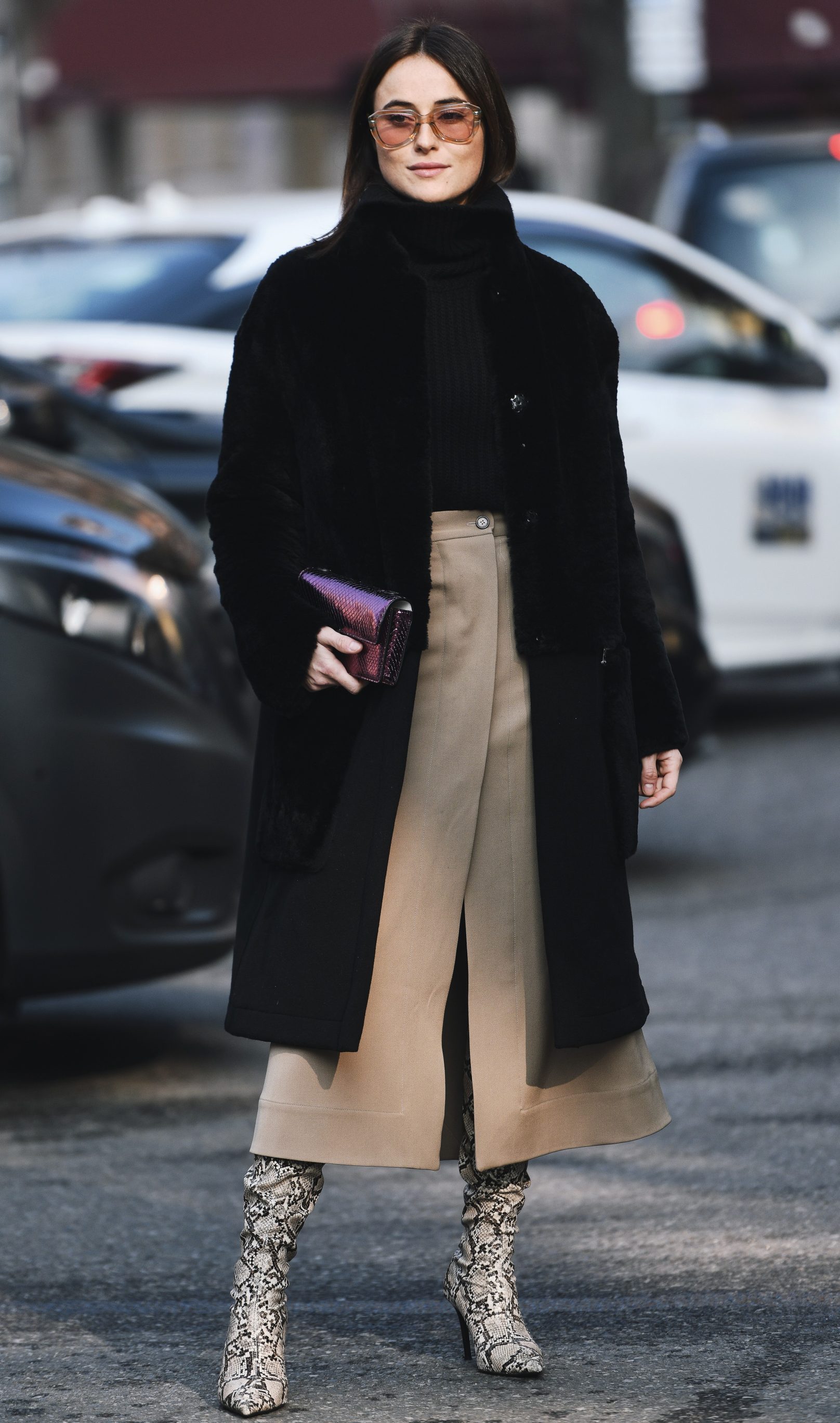 Long Light-Colored Skirt Styled with The Printed Boots, Black Sweater and Long Dark Coat