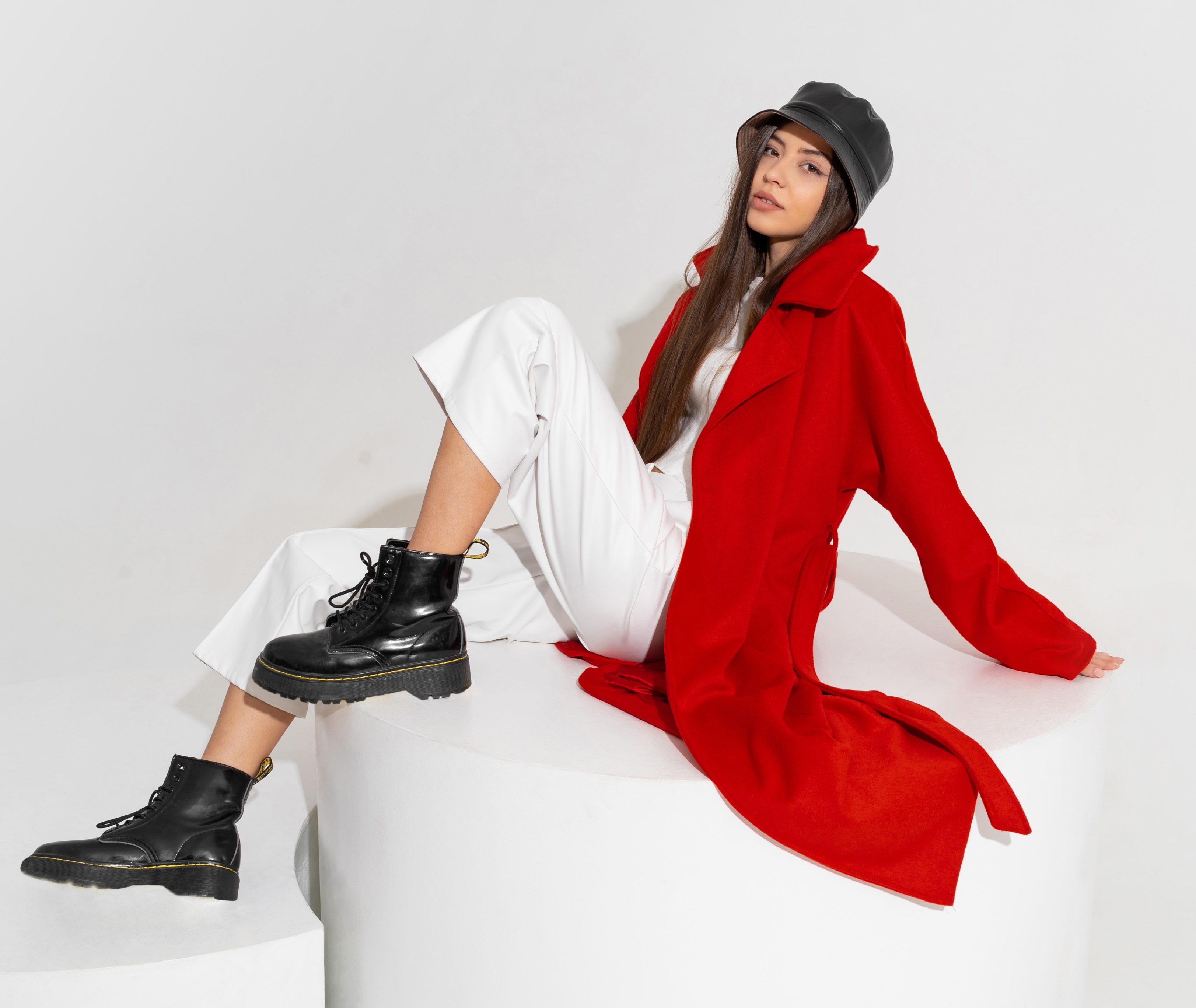 Whole white outfit Look Styled With Black Ankle Boots and Red Coat