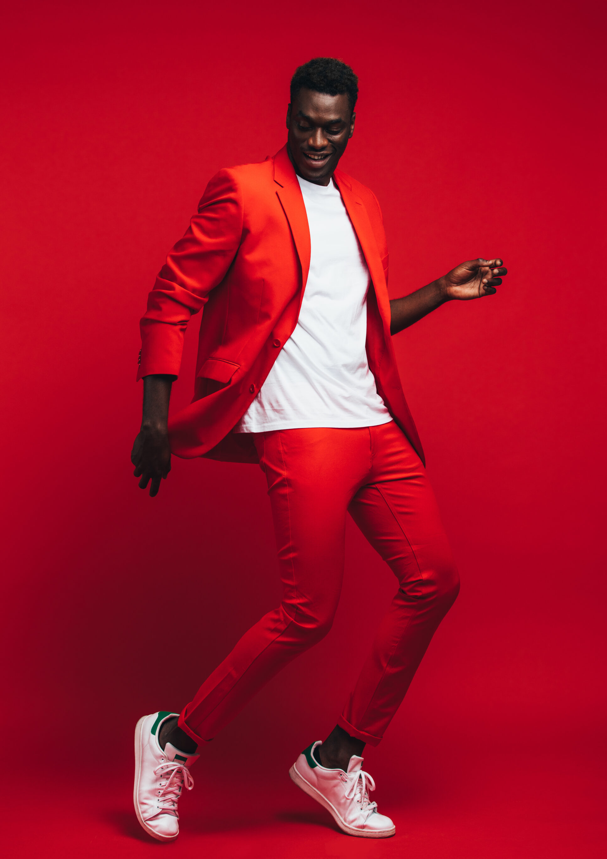 Red Suit, White Shirt, and White Sneakers