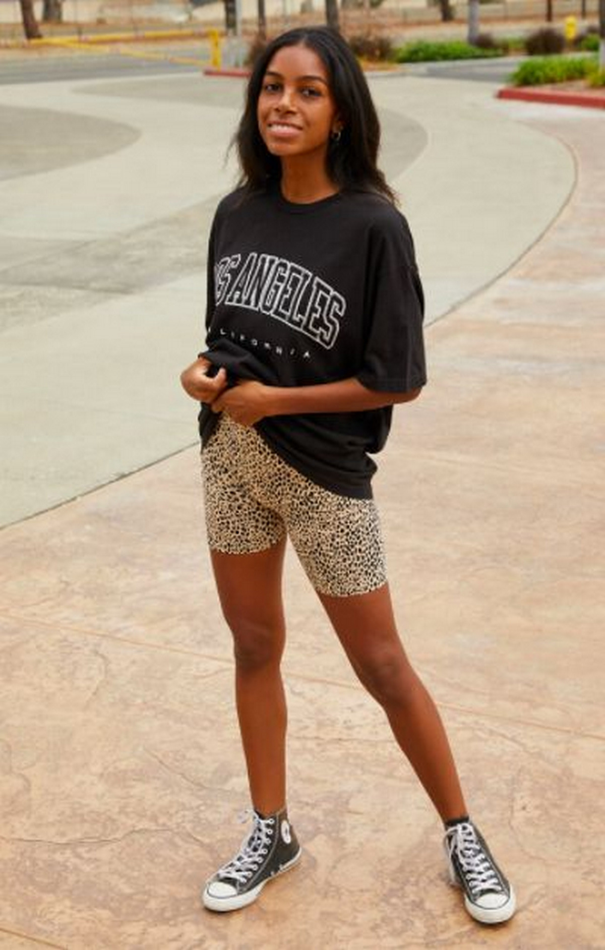 Oversized T-shirts with Cheetah Biker Shorts and Converse