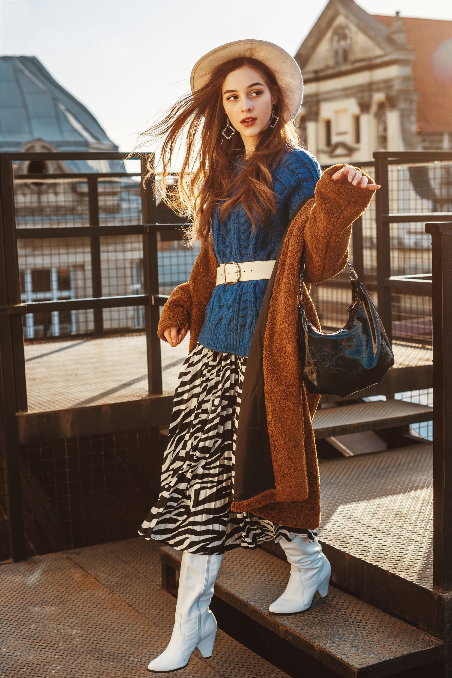 Brown Faux Fur Coat, Blue Knitted Sweater, Wide Belt, Pleated Zebra Print Skirt & White High Boots