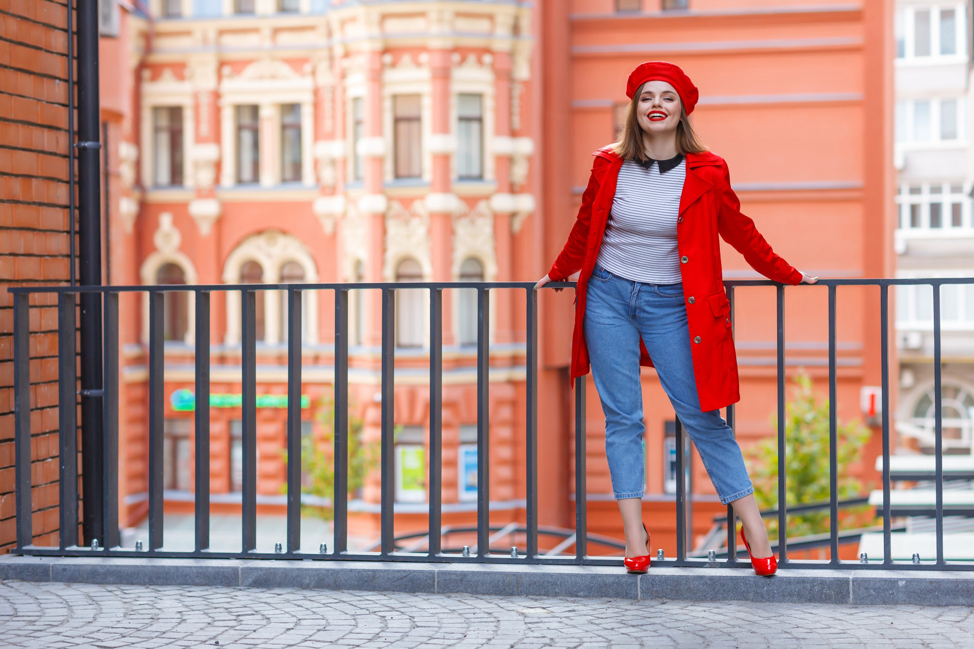 Jeans, Red Coat, And Red High-Heeled Shoes