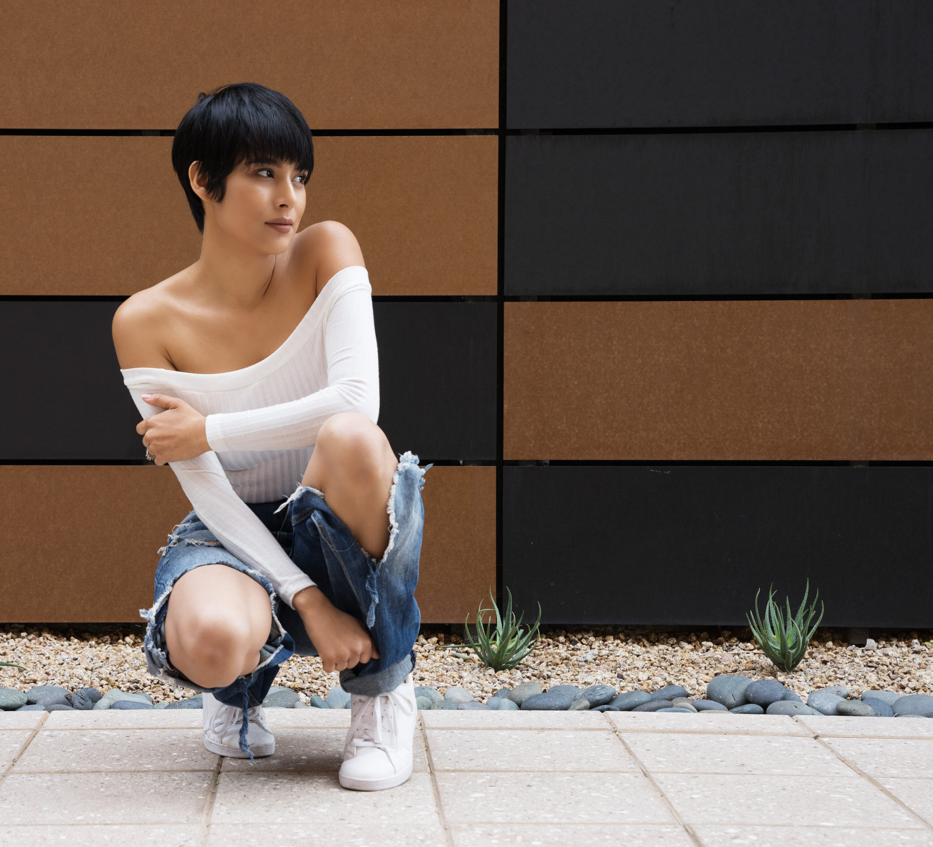 Off-Shoulder Tops, Boot Cut Jeans, And Sneakers