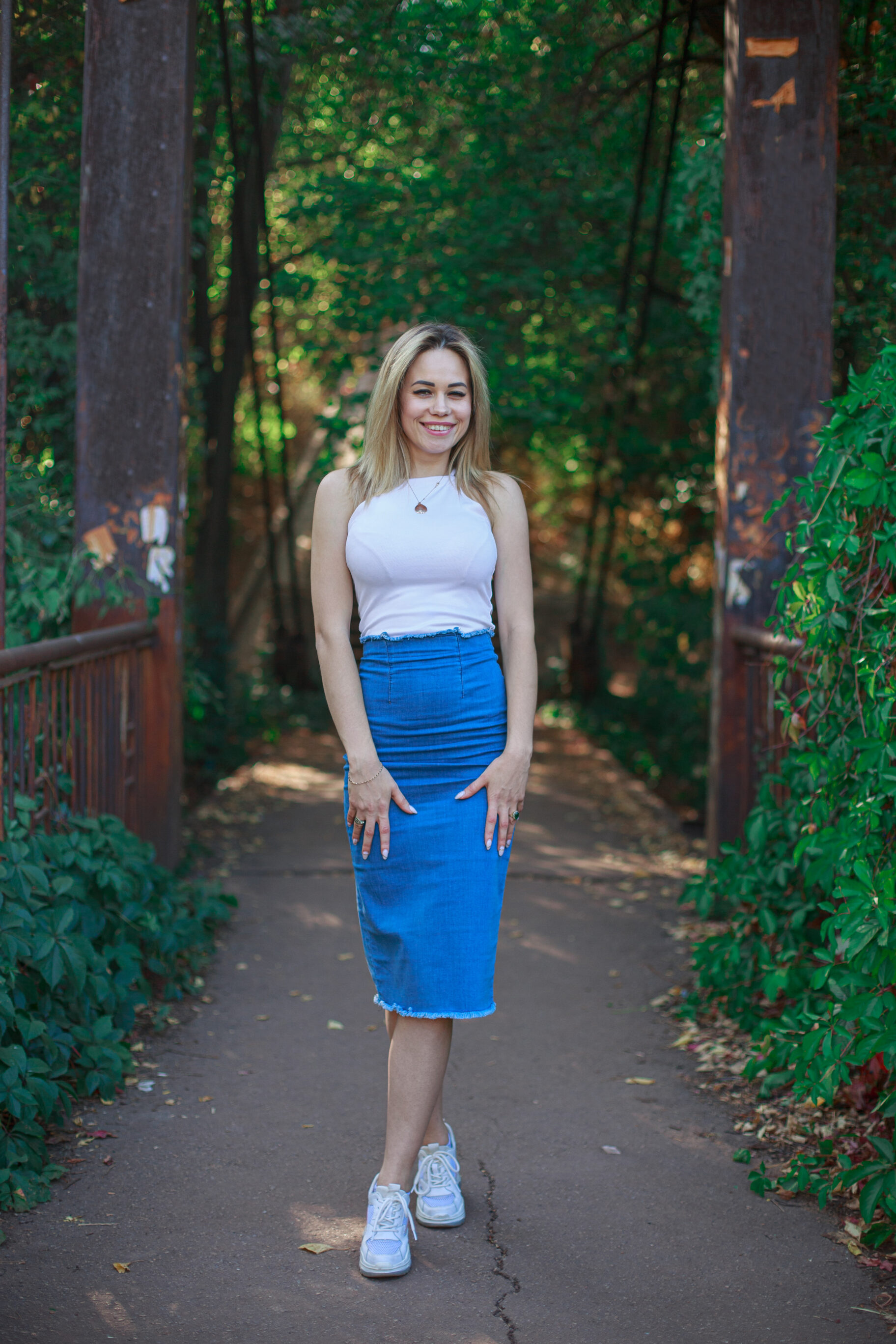 Midi Jean Skirt With Halter Tops And Sneakers