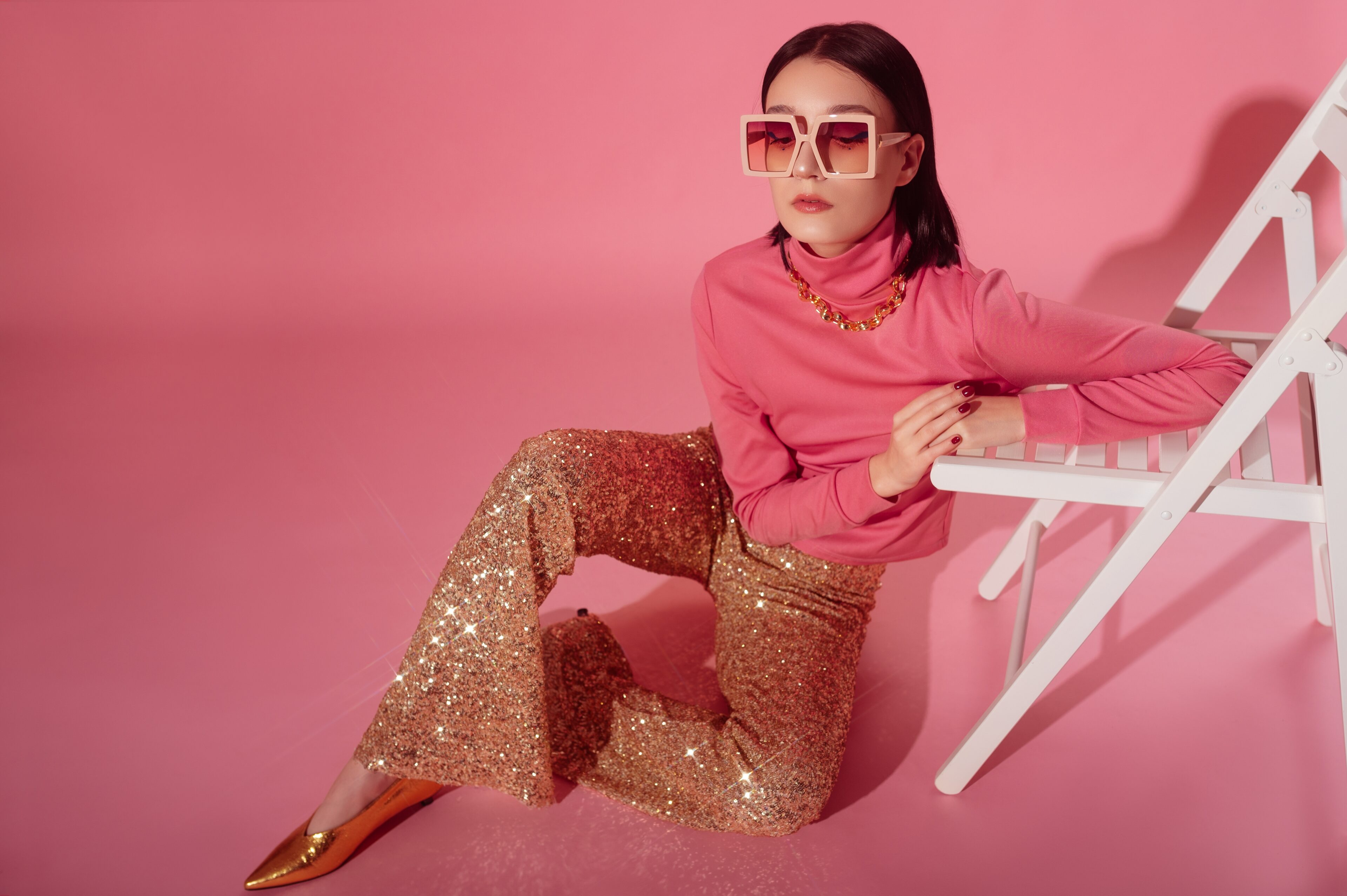 Pink Turtleneck Top & Golden Flared Sequin Pants