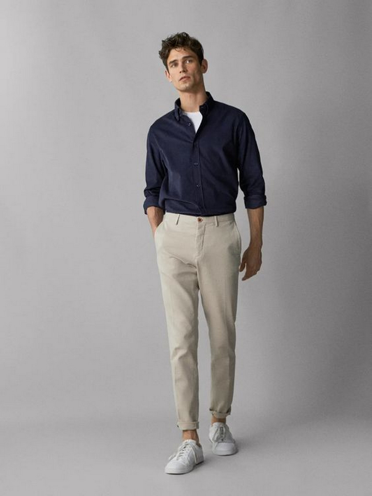 Chinos, Dark Shirt, And White Sneakers