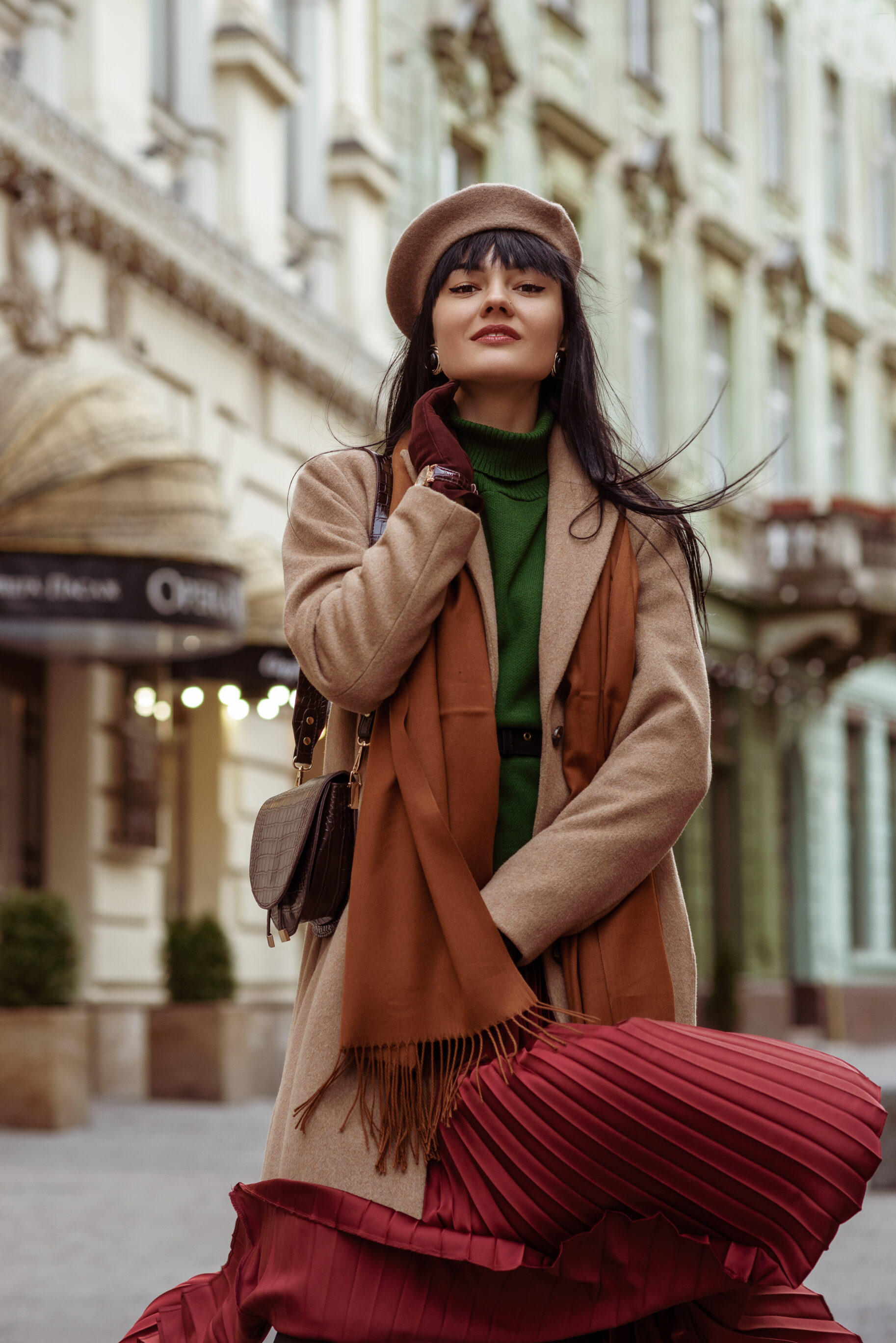 Beige Coat, Beret, Scarf, Pleated Skirt, And Green Turtleneck