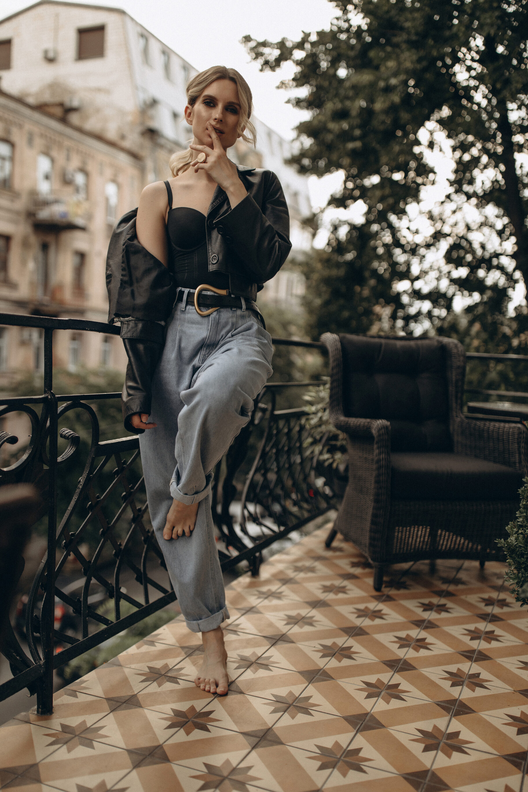 Black Leather Jacket, Corset, and Jeans