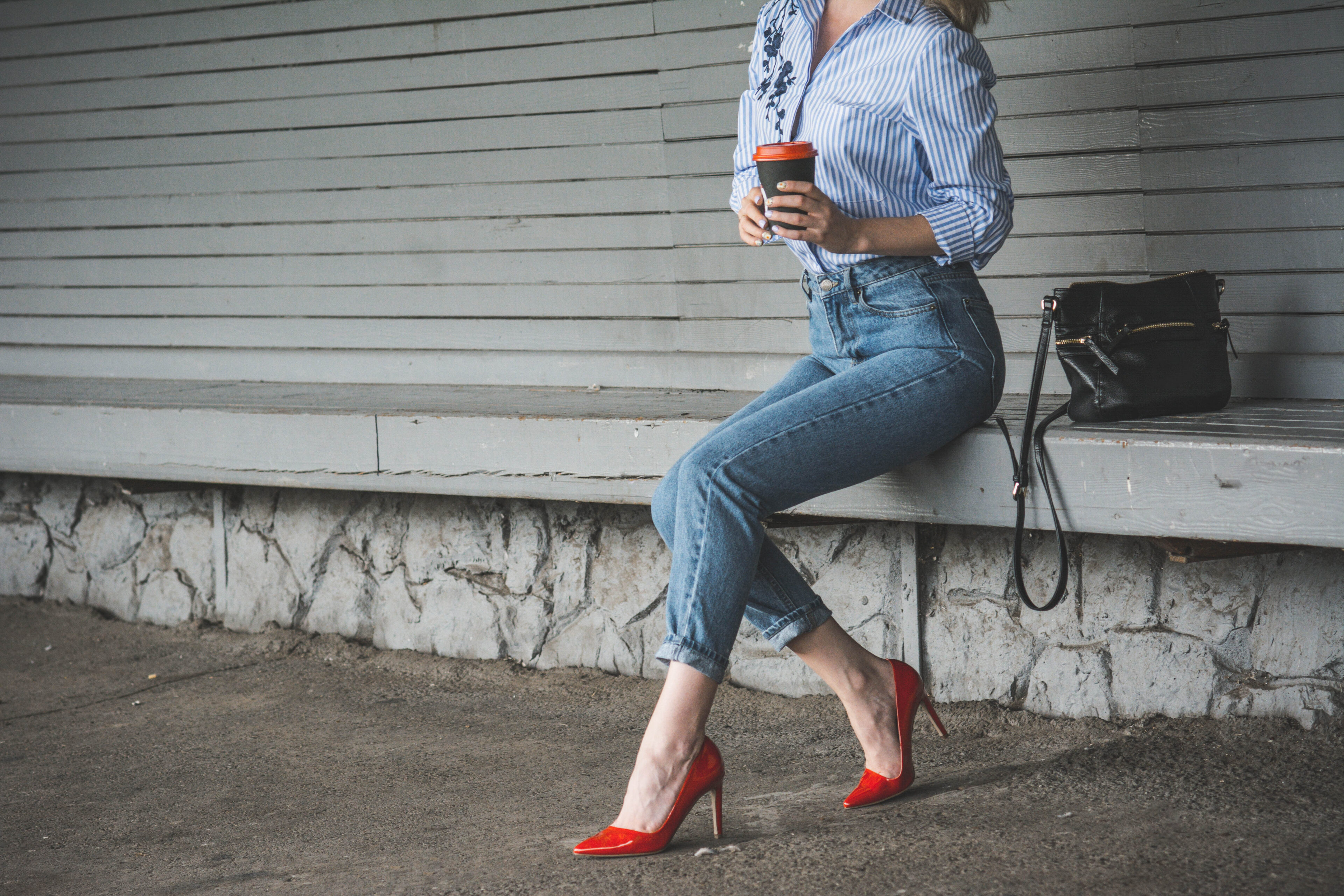 Navy Blue Striped Shirt, Mom Jeans, And Red Pumps