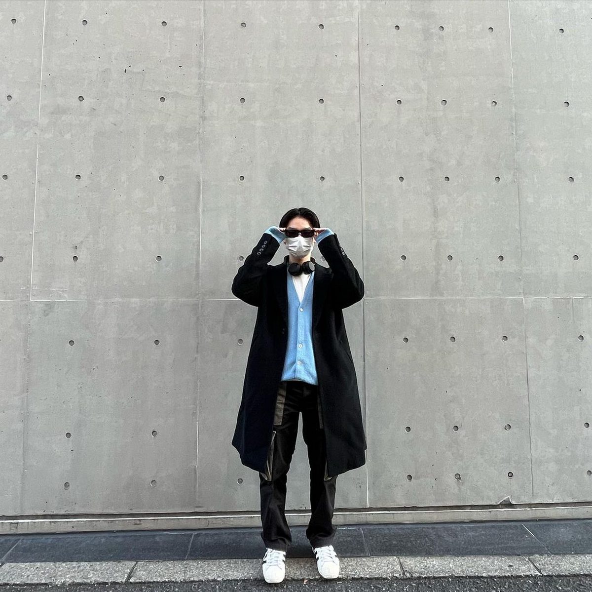 Black Long Coat, Blue Sweater, And Nice White Sneakers