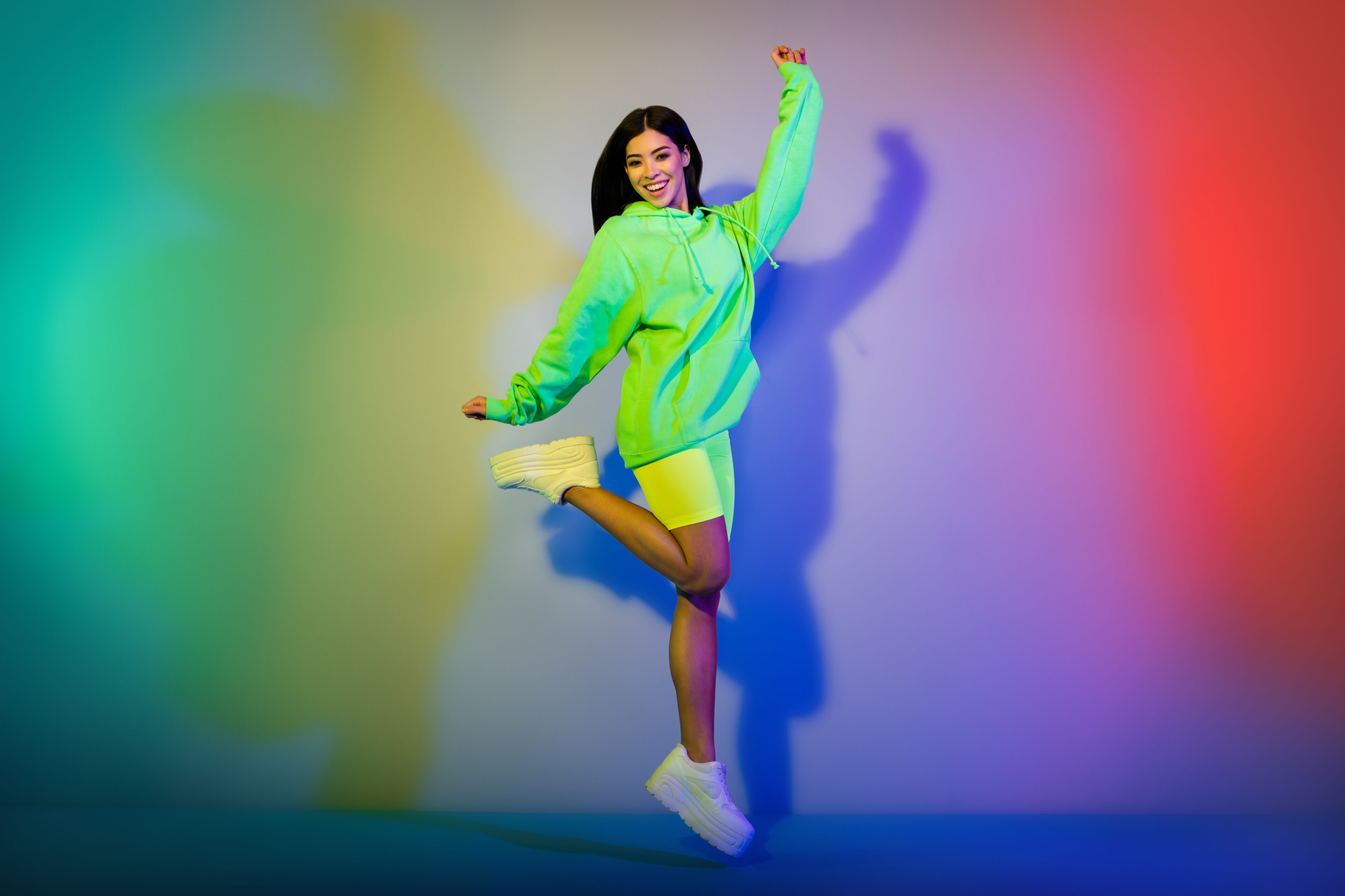 Blue Long-Sleeved Shirt, Yellow Shorts, And White Sneakers and Platform Shoes