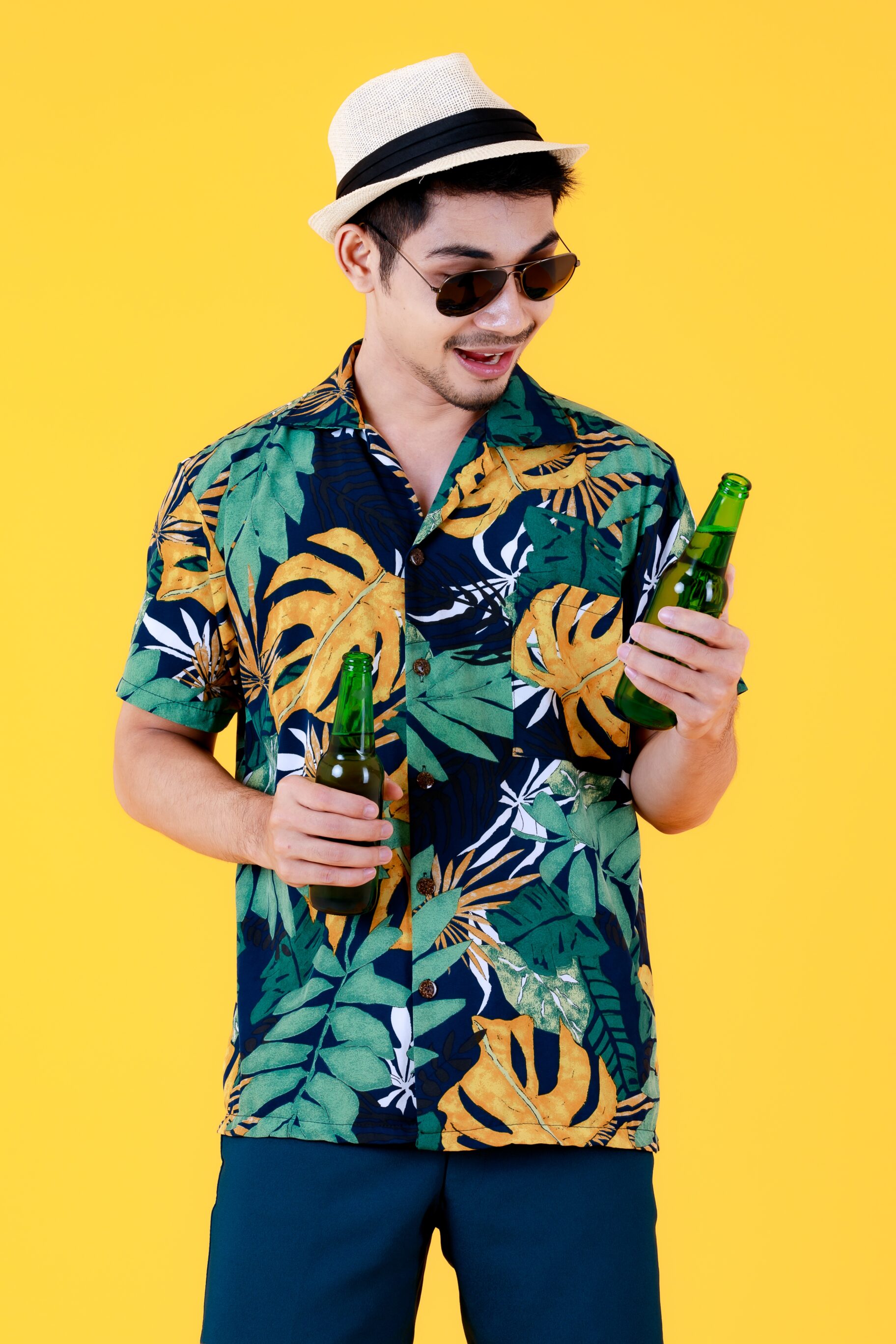 White Straw Hat, Leaf Pattern Shirt, and Blue Pants