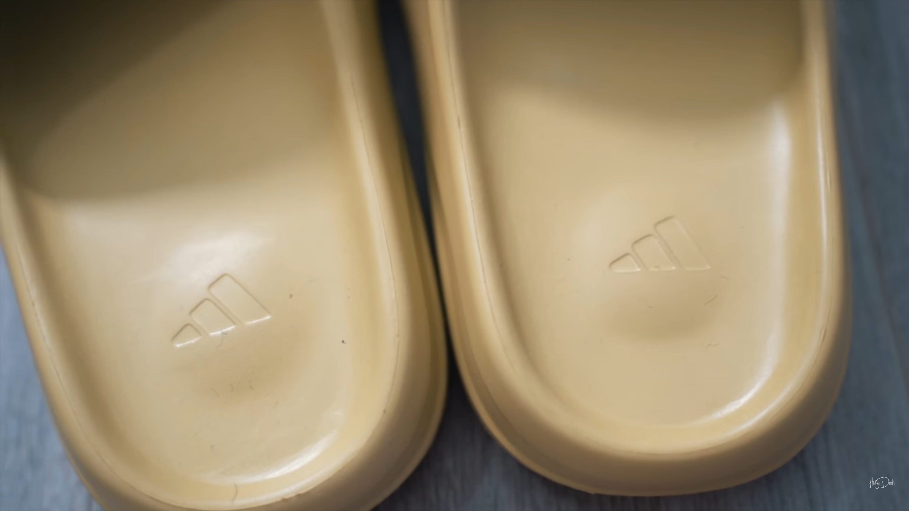 Adidas Yeezy Slides Zoom In with logo
