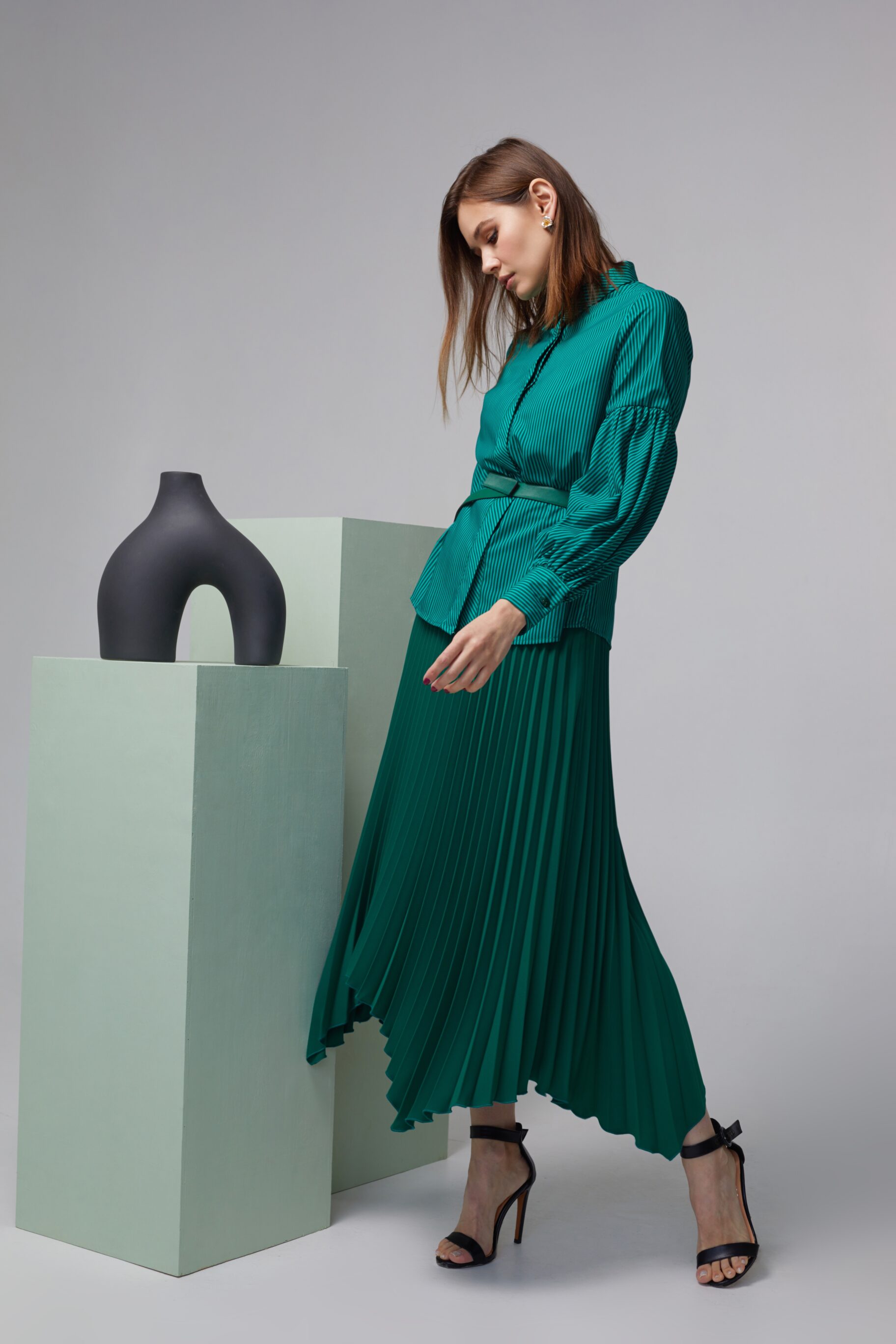 Turquoise Blouse And Green Pleated Skirt