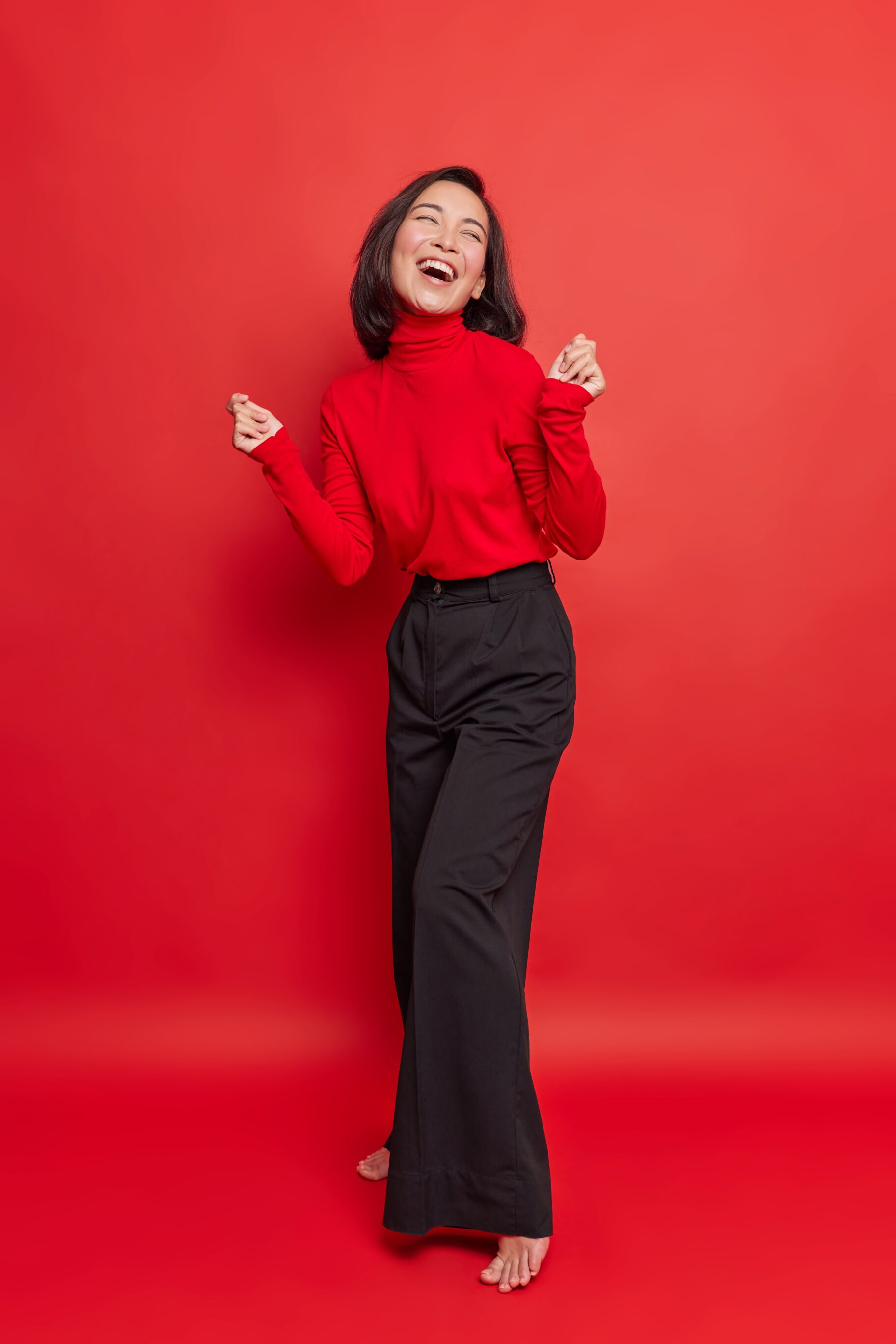 Red Turtleneck Top With Black Culottes Pants
