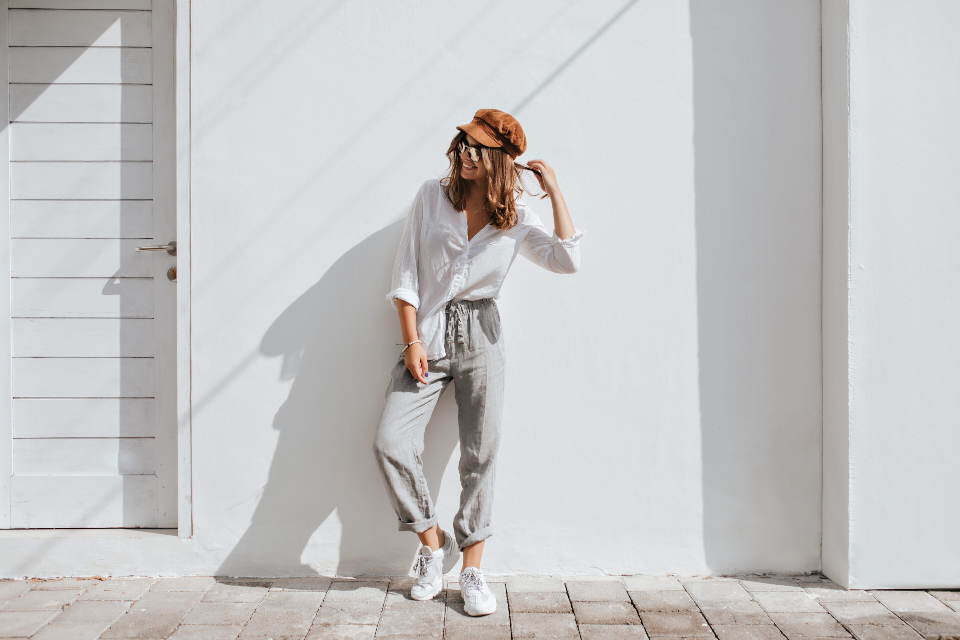 Gray Cotton Pants And A White Button-Down Shirt