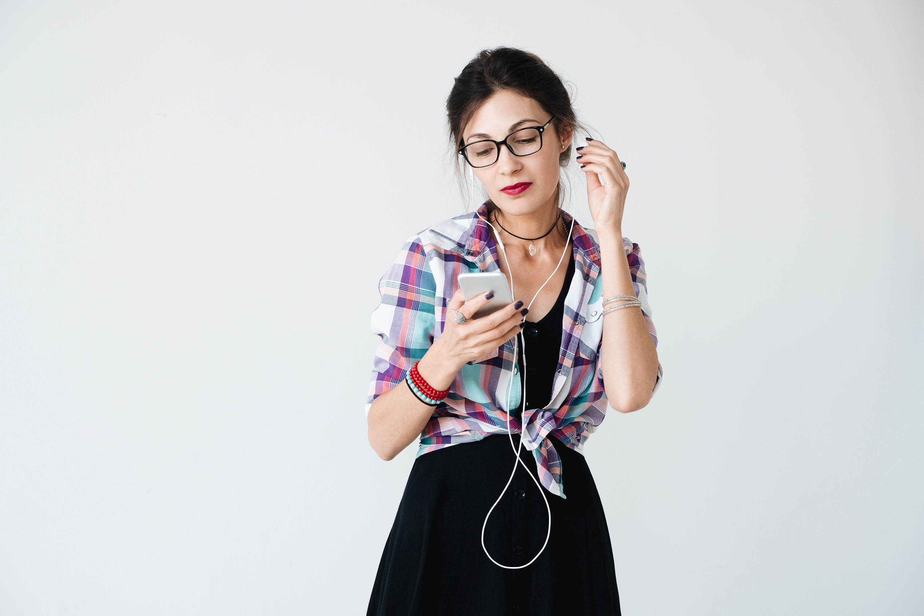 Colorful Plaid Shirt, Mini Skirt, And Glasses