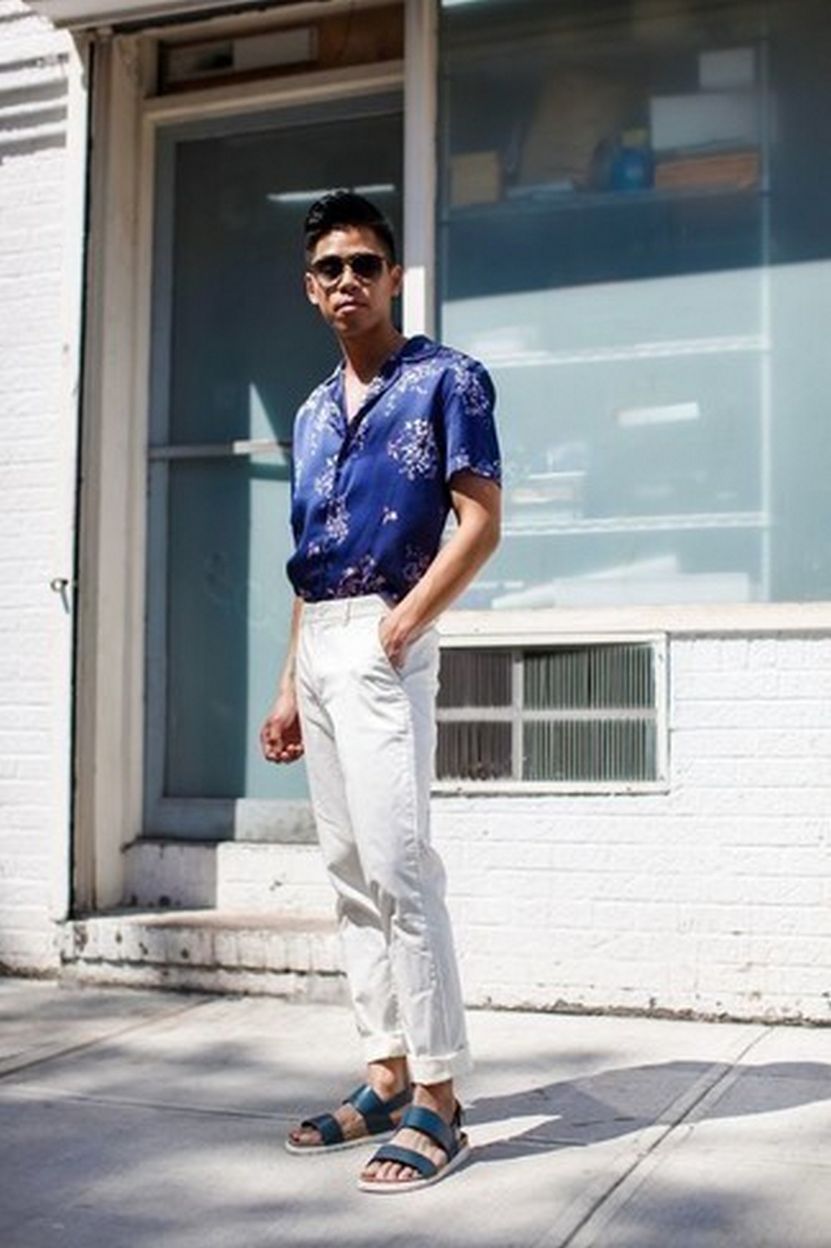 Patterned Shirt, White Pants, And Blue Leather Sandals