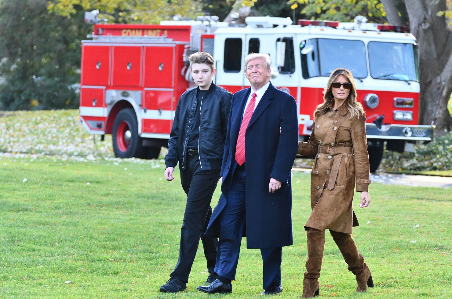 Donald Trump, his son Barron Trump (left), and First Lady Melania Trump