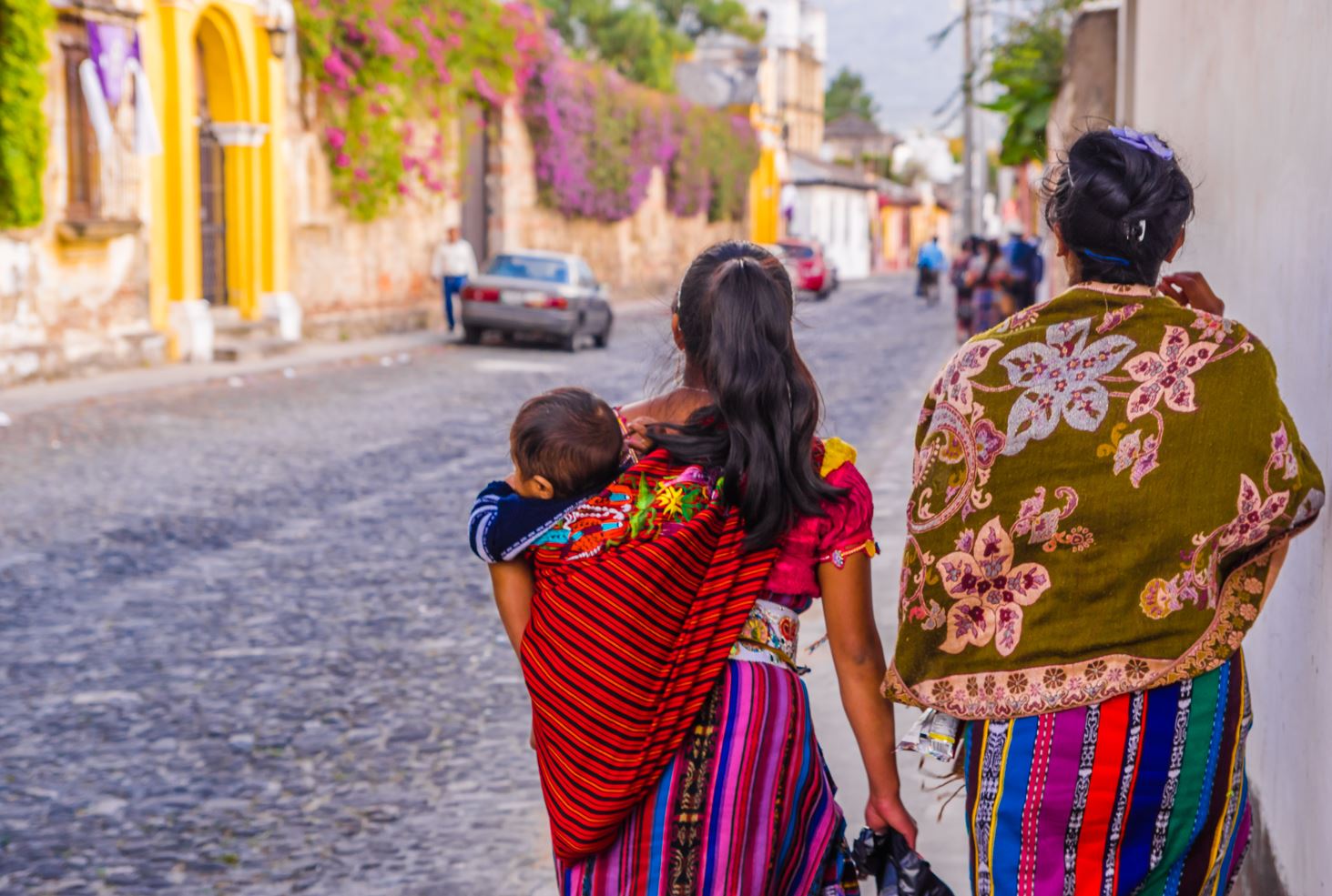 Two Guatemala females in their traditional clothes with really short height