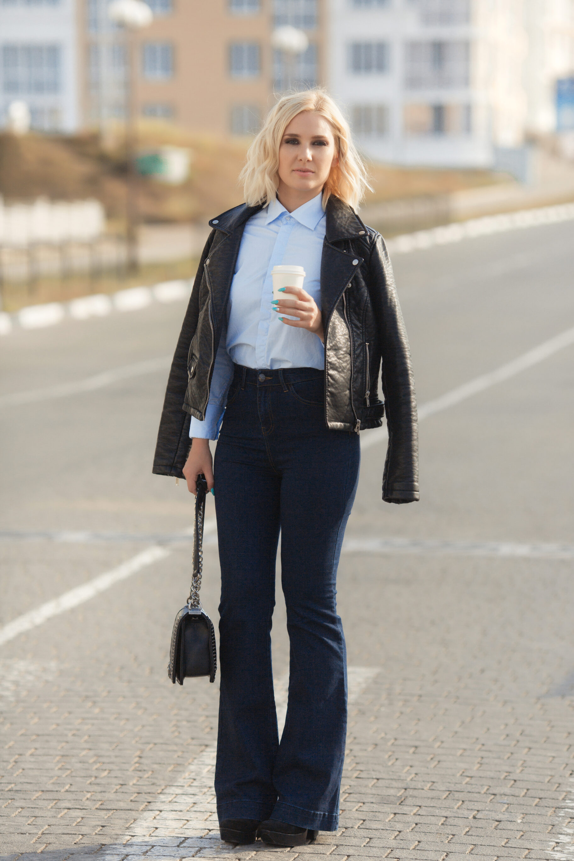 Black Jacket and Blue Shirt