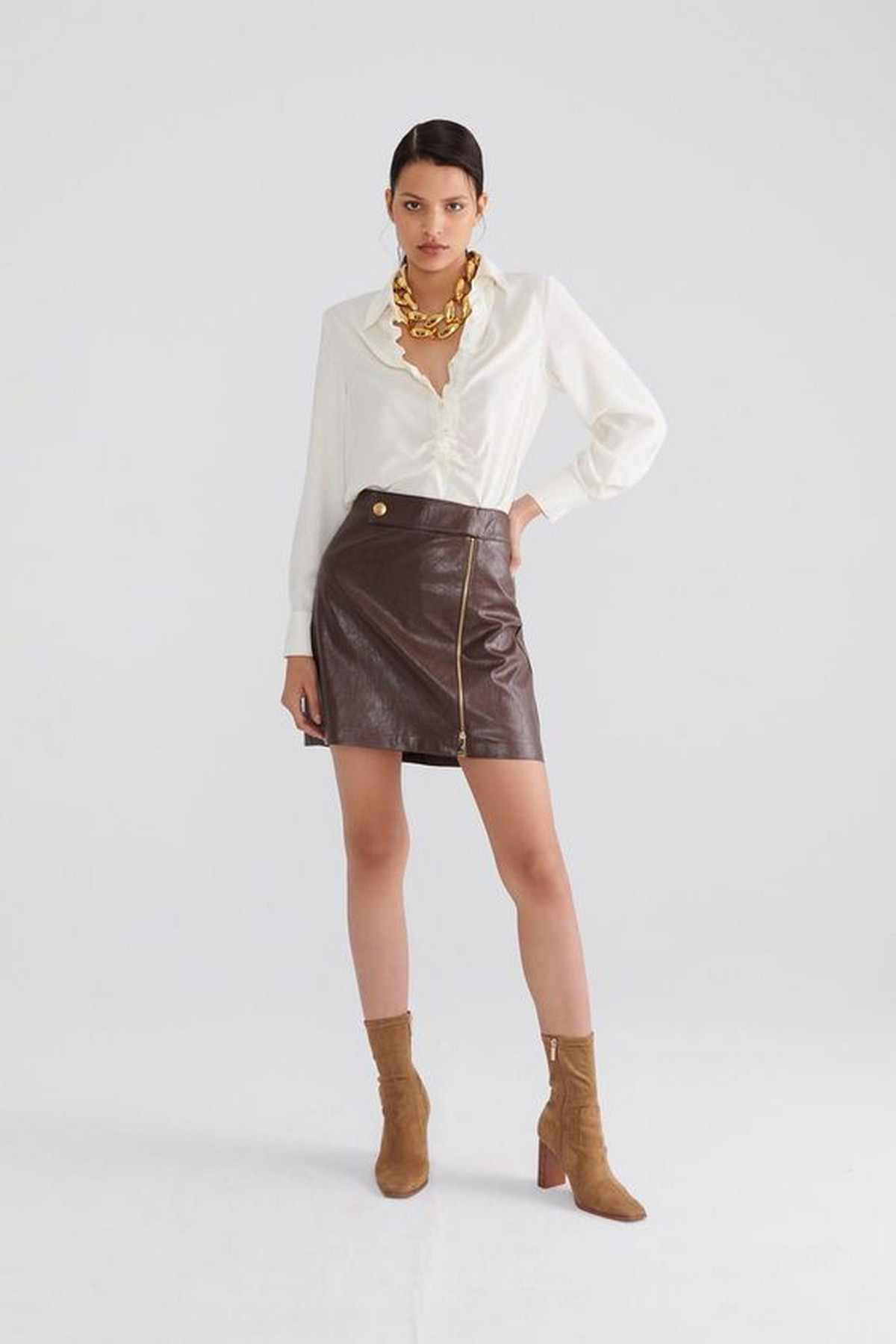 Mixing Leather Skirt And Shirt With Brown Boots