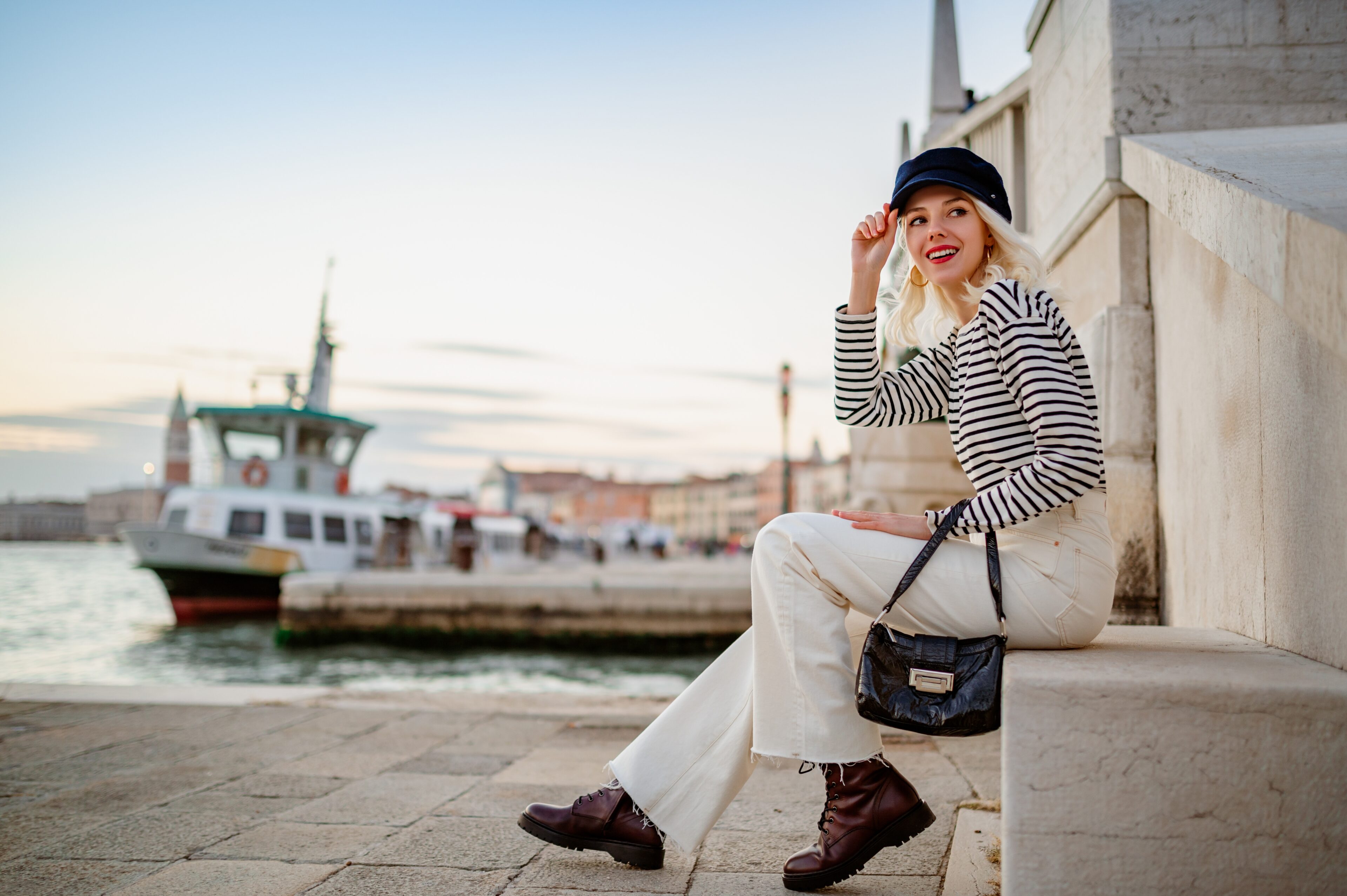 Striped Long-Sleeve Shirt, White Flare Jeans, and Leather Boots