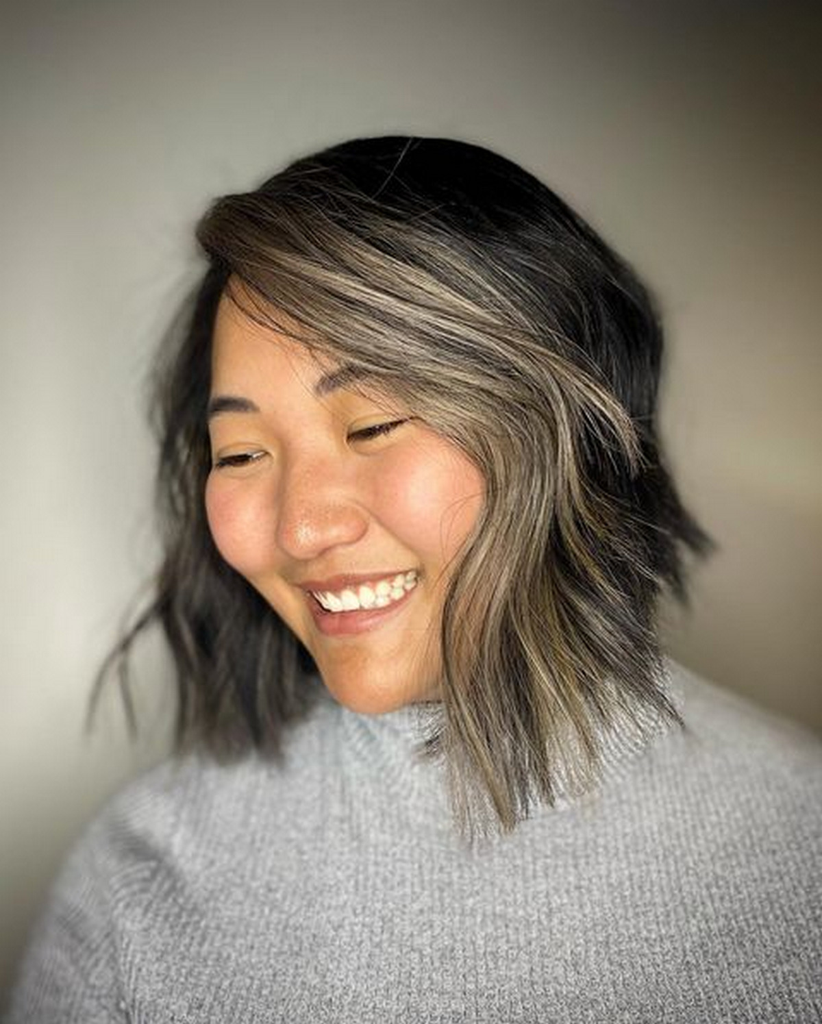 Choppy Wavy Side Parted Bob