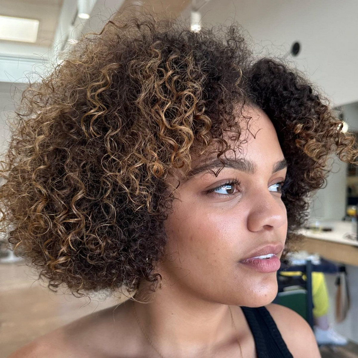 Short Curly Bob with Subtle Highlights