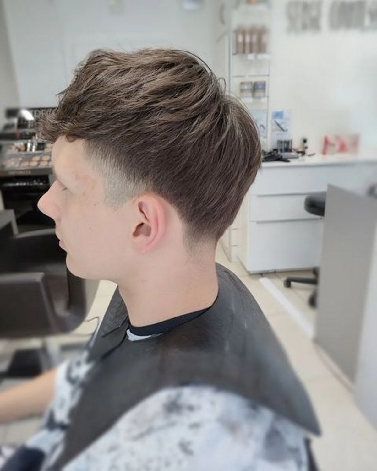 Low Fade Taper With Layer Bangs